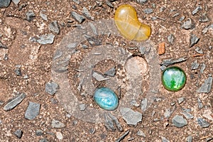 Colored stones embedded in concrete walkway