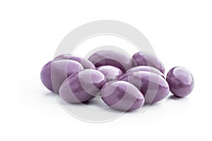 Colored sugared almonds isolated on white background