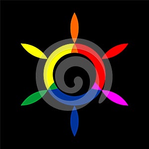 Colored sun symbol over black background photo
