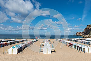 Colored tents on the beach, Nazare (Portugal)