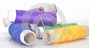 Colored threads with needles and blade