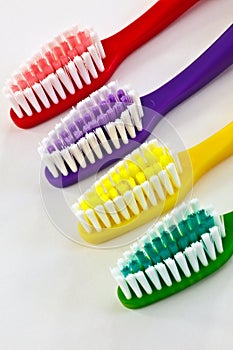 Colored tooth brushes