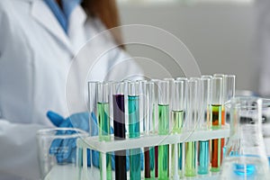 Colored toxic and poisonous liquids in test tubes in laboratory