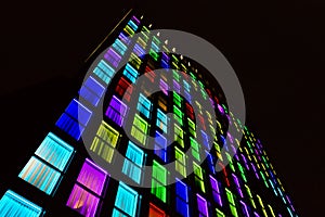 Colored windows texture. Neon light background