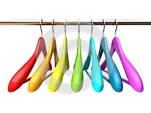 Colored wood hangers isolated on the white background