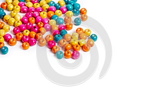 Colored wooden beads isolated on a white background