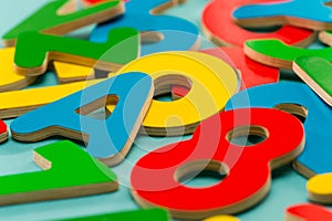 Colored wooden numbers and letters for children