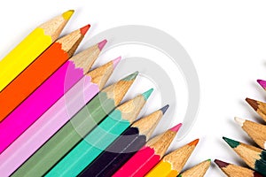 Colored wooden sharpened pencils for office and school on a white background