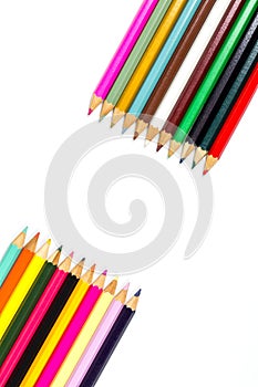 Colored wooden sharpened pencils for office and school on a white background