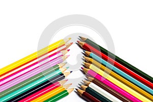 Colored wooden sharpened pencils for office and school on a white background