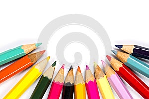 Colored wooden sharpened pencils for office and school on a white background