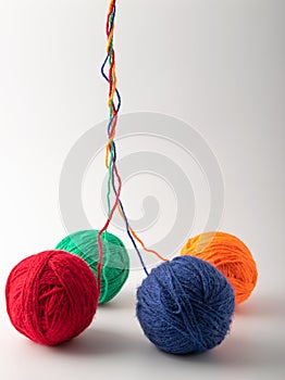 Colored wool knit balls placed on a