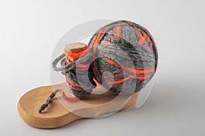 Colored wool knit balls placed on a