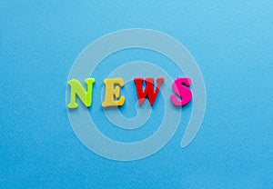 Colored word `milk` from plastic magnets