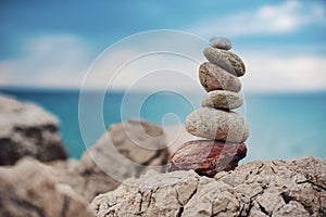 Colored zen stones at sea and sea