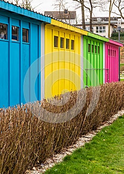 Colorfful booths in a city park. View from the back. Rapprochement.