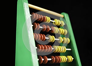 Colorful abacus on black background