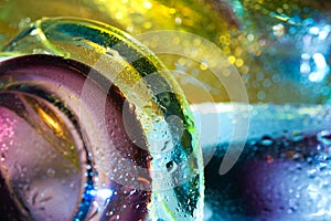 Colorful abstract background. Glass drops water.