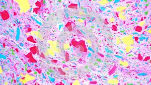 Colorful abstract background, moving spots of paint on the liquid surface. Motley backdrop for VJ and motion design.