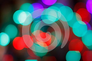 Colorful abstract blurred circular bokeh light of night city street for background.