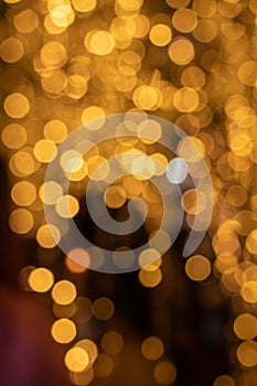 Colorful abstract bokeh blur defocus  background.Bokeh background for festival season.Gold bokeh blur defocus in black