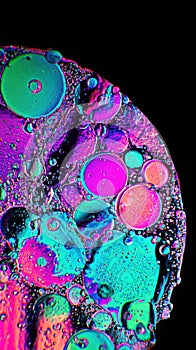 Colorful Abstract Pattern of Bubbles and Liquid on Black Background