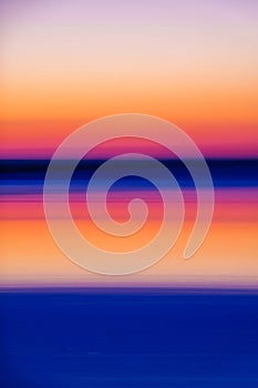Colorful abstract sunset seascape with vibrant hues