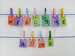 Colorful abstract welcome home banner on a white background