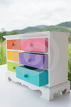 Colorful of accessories cabinet with drawer