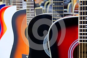 Colorful acoustic guitars