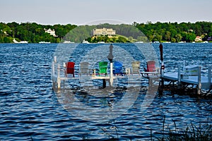 Colorful Adirondack Chairs on a Pier