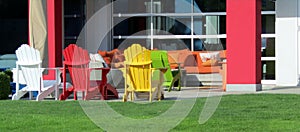 Colorful Adirondack chairs and sofas at the patio