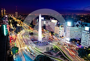 Colorful Aerial view of Buenos Aires and 9 de julio avenue at night - Buenos Aires, Argentina photo