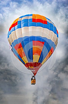 Colorful airballoon in a dangerous flight up photo