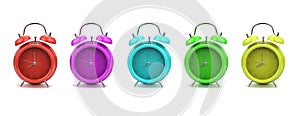 Colorful alarm clocks isolated on white background