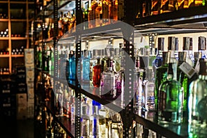 Colorful alcohol bottles in bar