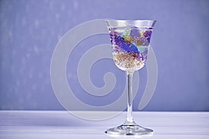 Colorful alcoholic cocktail with jelly balls inside the glass