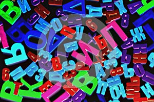 Colorful alphabet letters on a magnet on black