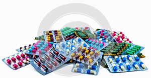 Colorful of antibiotic capsule pills isolated in blister pack isolated on white background with copy space. Antibiotic drug