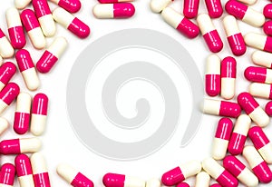 Colorful of antibiotic capsules pills in circle pattern isolated on white background with copy space