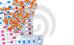 Colorful of antibiotic capsules pills isolated on white background with clipping path.