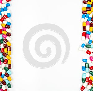 Colorful of antibiotic capsules pills on white backgroud