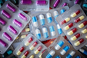 Colorful antibiotic drug capsule pills in blister package