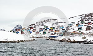Colorful arctic fishing village houses at the rocky fjord  in the middle of nowhere, Kangamiut
