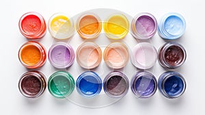 Colorful array of paint jars showcasing a rainbow selection for artists and hobbyists, on a clean background. Top view.