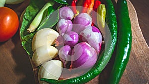 Colorful asian spices on cutting board