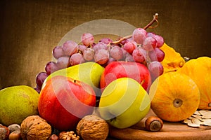 Colorful assorted of fruits on fabric background