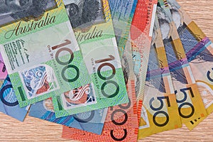 Colorful australian dollar banknotes close up on table