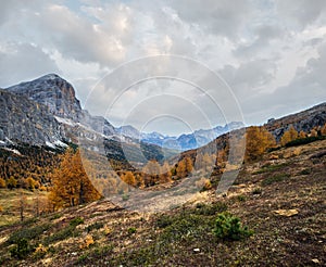 Colorful autumn alpine Dolomites mountain scene, Sudtirol, Italy. Peaceful view from Falzarego Path