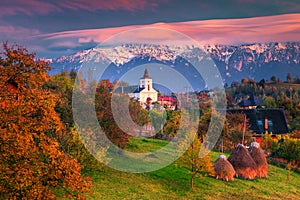 Colorful autumn alpine rural landscape near Brasov, Magura, Transylvania, Romania